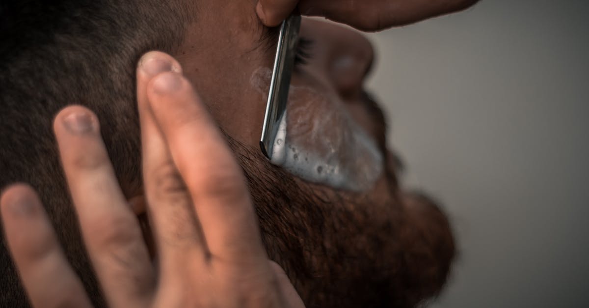 Will barbers in Taiwan shave a beard/a week's growth? If so, how much does it cost? - Person Holding Gray Straight Razor Will barbers in Taiwan shave a beard/a week's growth? If so, how much does it cost? - Person Holding Gray Straight Razor