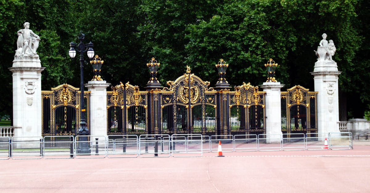Will gate agents in London know if I'm "undesirable" before my stop-over in Johannesburg? [duplicate] - Black and Gold Gate Near the Green Trees