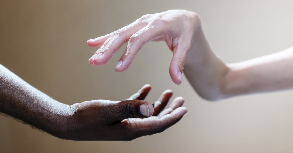 Will getting refused on a Diversity Visa application complicate my future entries to the United States? - Photo Of People's Hands