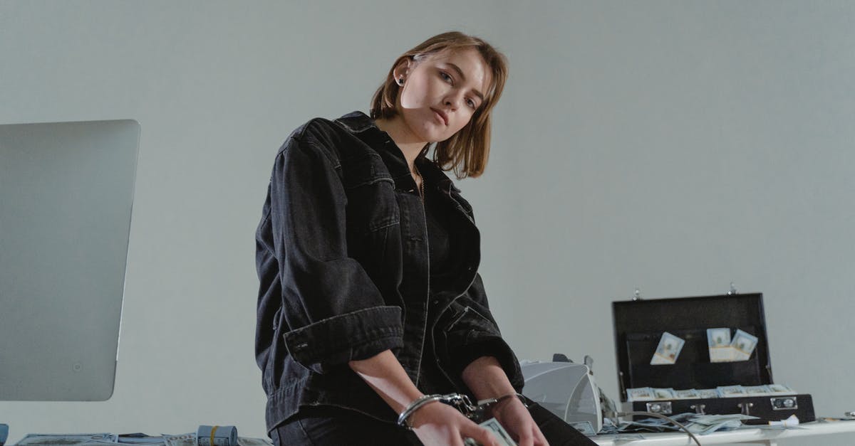 Will I be denied entry to the US for a criminal charge? - A Woman Sitting on the Table Will I be denied entry to the US for a criminal charge? - A Woman Sitting on the Table