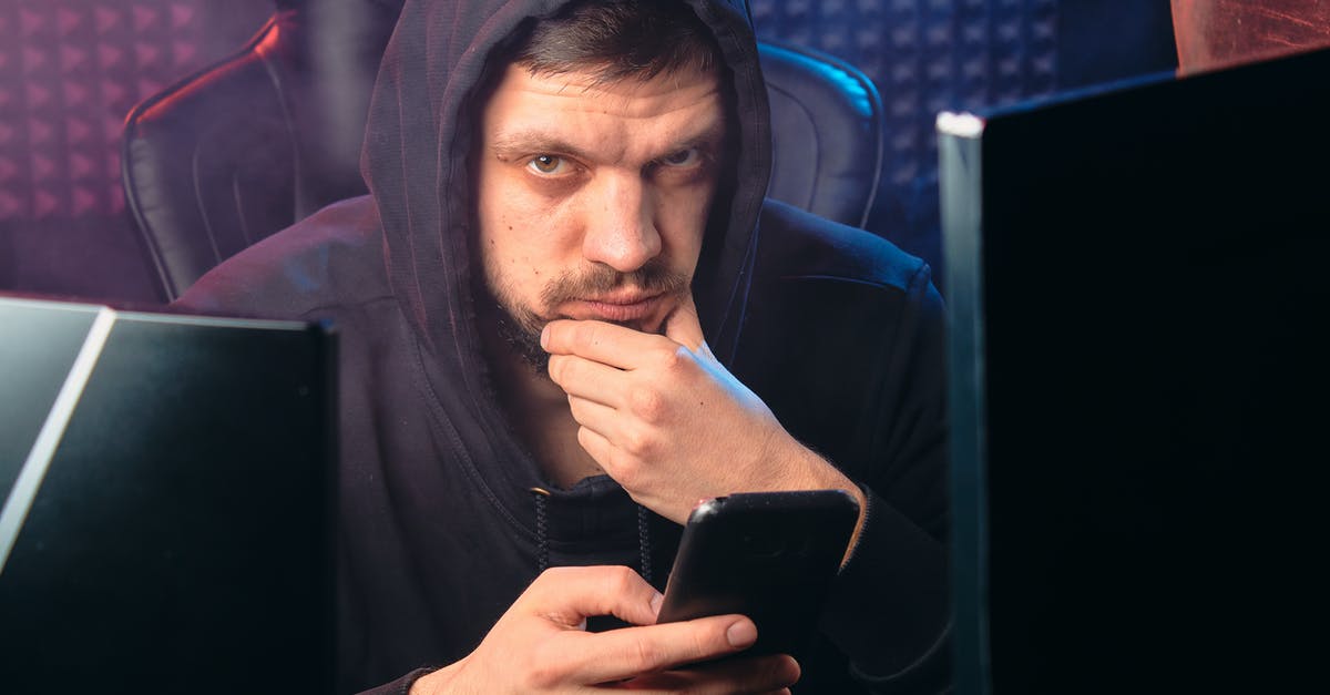 Will I be denied entry to the US for a criminal charge? - Man in Black Hoodie Holding Black Smartphone Will I be denied entry to the US for a criminal charge? - Man in Black Hoodie Holding Black Smartphone