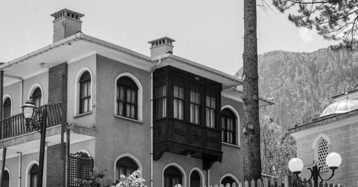 Will I be refused a residence permit for having overstayed my Schengen visa? [closed] - Monochrome Shot of a Building