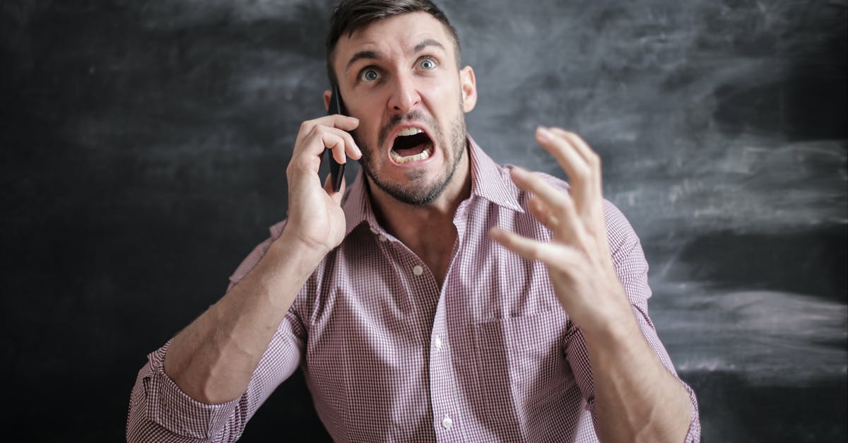 Will I face any problem if I apply for an India transit or tourist visa in the future if I didn't use the previous one? - Man in Pink Dress Shirt