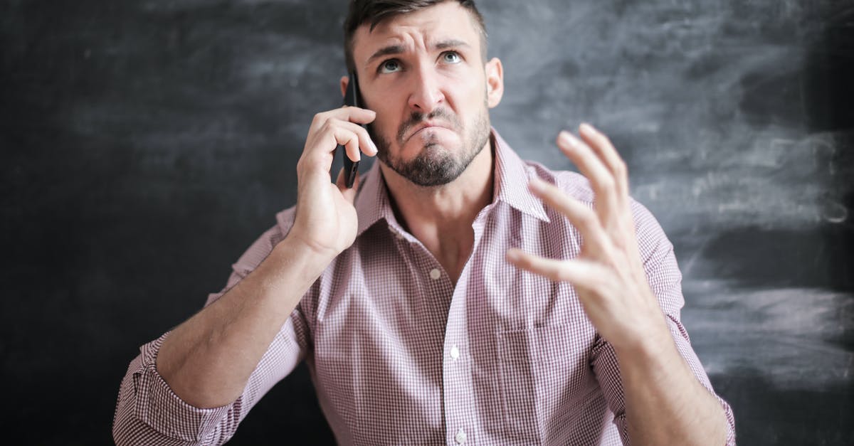 Will I face any problem if I apply for an India transit or tourist visa in the future if I didn't use the previous one? - Man in Pink Dress Shirt