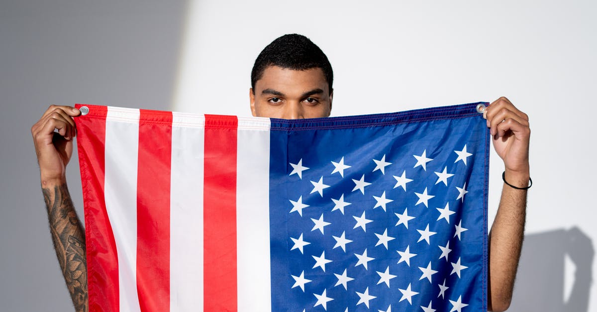 Will I face problems if staying 91 days in the US visa-free? - Man Behind an American Flag Will I face problems if staying 91 days in the US visa-free? - Man Behind an American Flag
