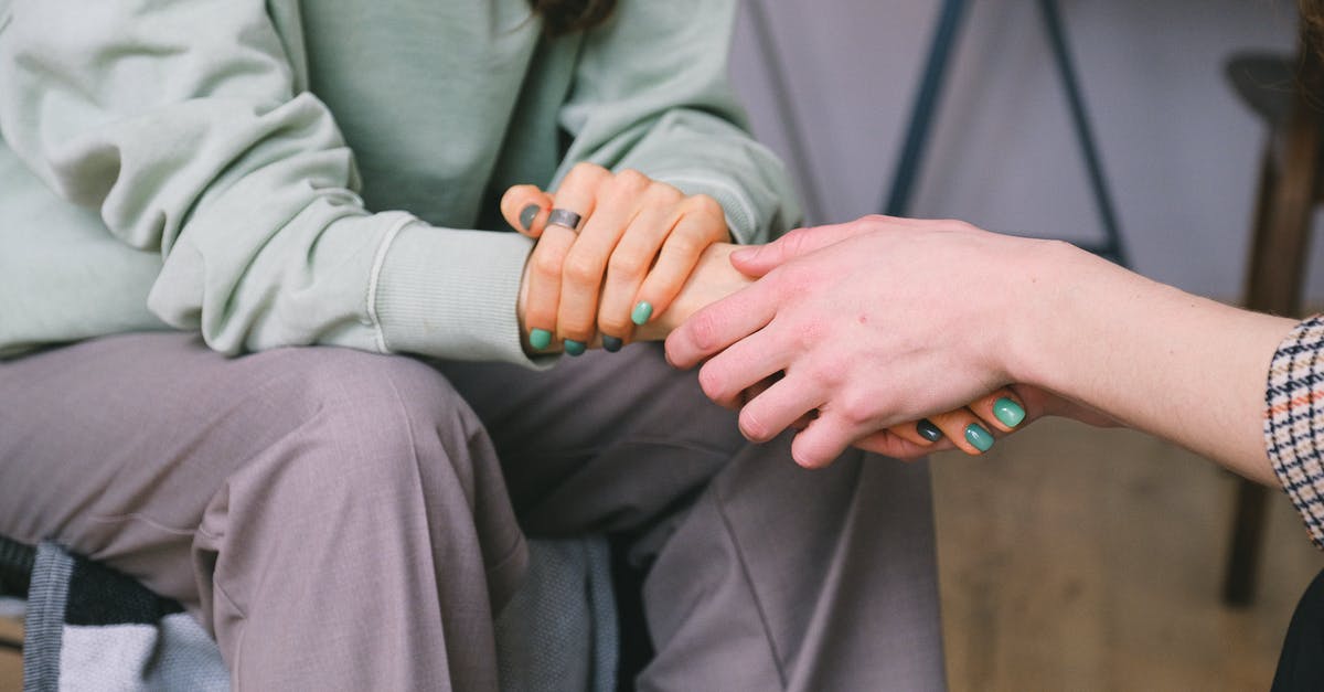 Will I have any problem entering the U.S. with a band aid on my finger? - Crop psychologist supporting patient during counseling indoors Will I have any problem entering the U.S. with a band aid on my finger? - Crop psychologist supporting patient during counseling indoors