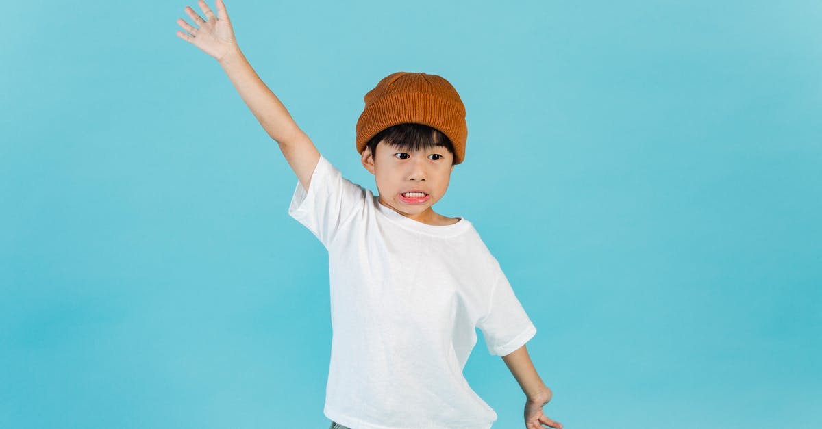 Will I have problems in future applications if my Schengen visa doesn't have an exit stamp? - Astonished stylish Asian boy wearing hat and white t shirt looking away while standing with outstretched arms in light studio Will I have problems in future applications if my Schengen visa doesn't have an exit stamp? - Astonished stylish Asian boy wearing hat and white t shirt looking away while standing with outstretched arms in light studio