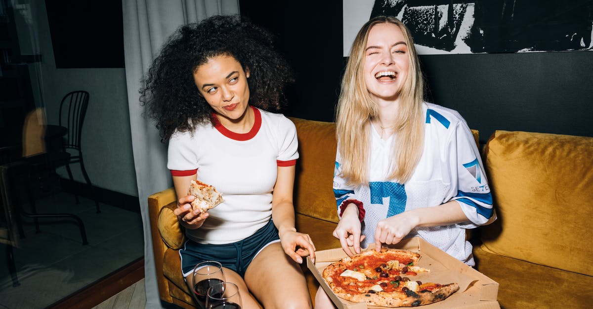 Will I have to pay extra for a seat if no standard are left? - Two Young Women Eating and Getting a Slice of Pizza Will I have to pay extra for a seat if no standard are left? - Two Young Women Eating and Getting a Slice of Pizza