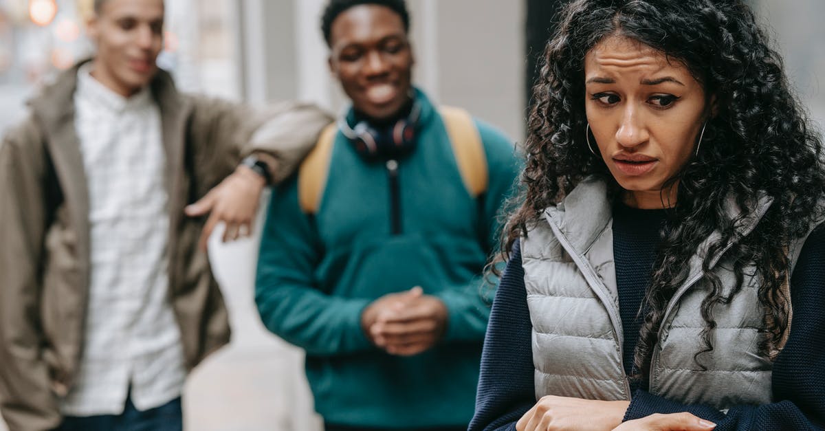 Will I have trouble getting a B1/B2 visa after overstaying my ESTA by 1 day? - Laughing multiracial teenage boys mocking at depressed young ethnic female standing on street after school Will I have trouble getting a B1/B2 visa after overstaying my ESTA by 1 day? - Laughing multiracial teenage boys mocking at depressed young ethnic female standing on street after school