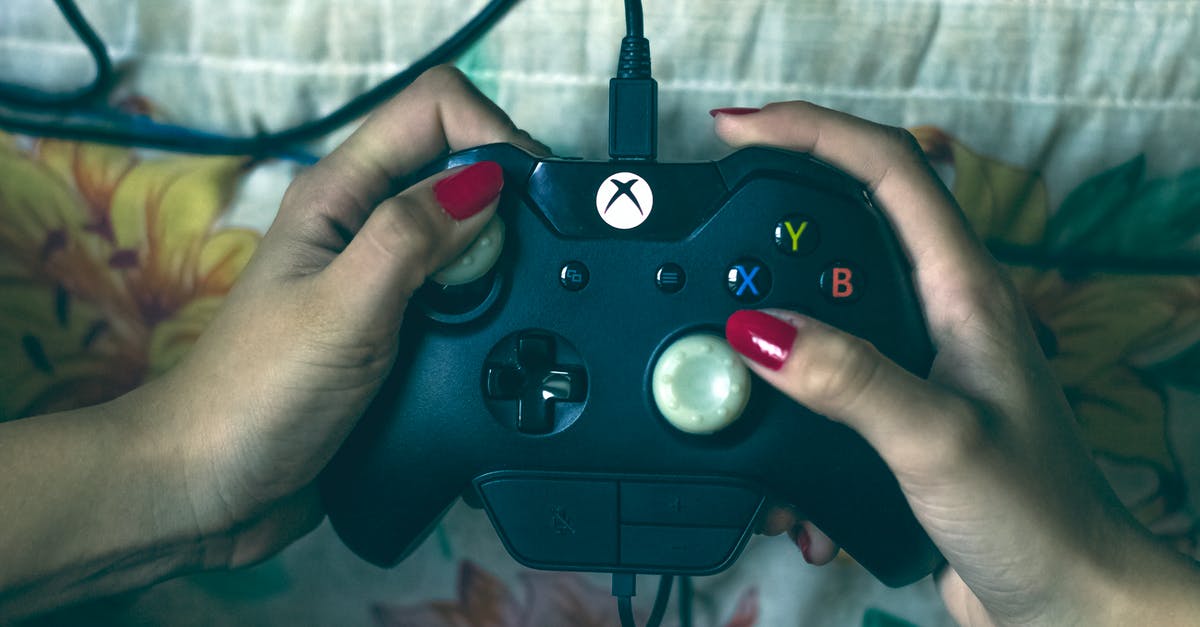 Will I owe customs duty on my Xbox one x while visiting Israel? - Person Holding Microsoft Xbox One Controller Will I owe customs duty on my Xbox one x while visiting Israel? - Person Holding Microsoft Xbox One Controller