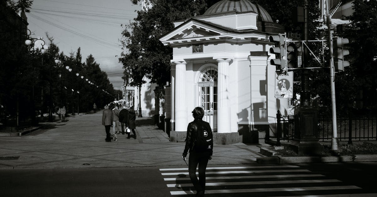 Will it matter if I cross the Russian border 6 hours after my visa expires? - Unrecognizable pedestrian crossing road with zebra near classic chapel Will it matter if I cross the Russian border 6 hours after my visa expires? - Unrecognizable pedestrian crossing road with zebra near classic chapel