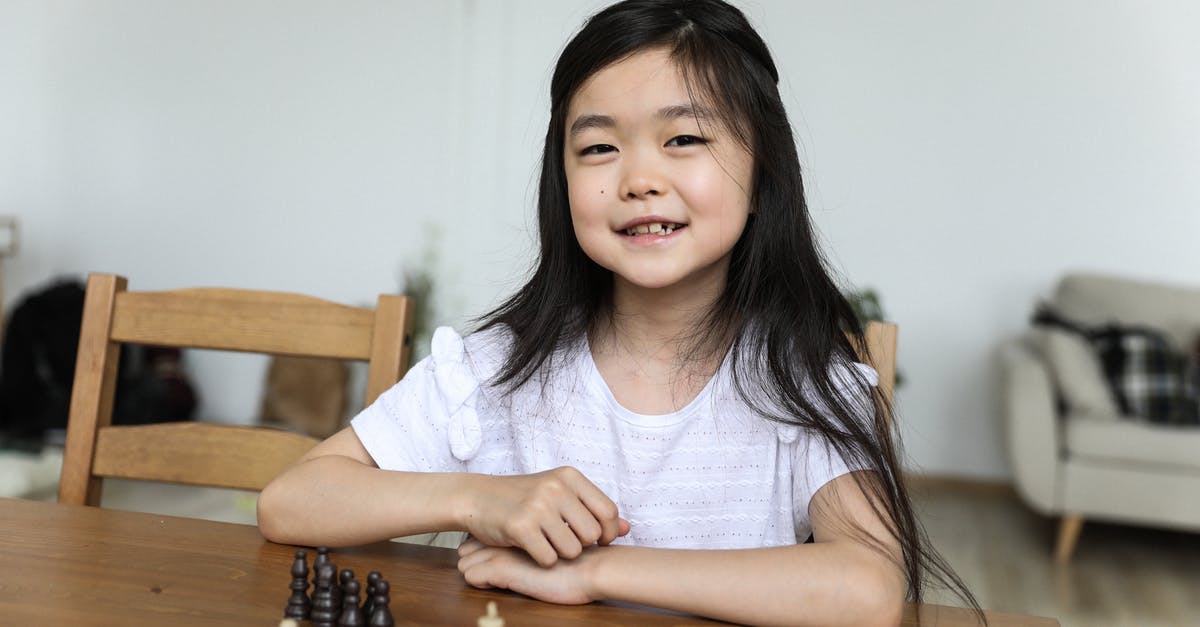 Will knowledge of Yiddish be useful traveling in Israel? - Happy cute Asian girl sitting at table with chessboard Will knowledge of Yiddish be useful traveling in Israel? - Happy cute Asian girl sitting at table with chessboard
