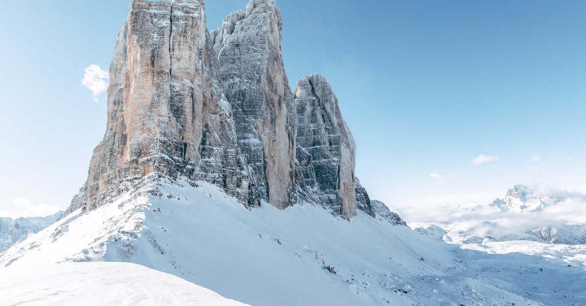 Will May be snowy in the Dolomites? - A Rock Mountain Surrounded By Snow Covered Ground Will May be snowy in the Dolomites? - A Rock Mountain Surrounded By Snow Covered Ground
