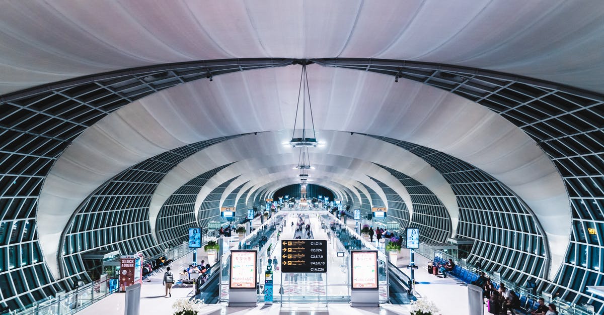 Will my Indian passport be stamped at Bangkok airport while I'm transiting? - People Walking in the Airport Will my Indian passport be stamped at Bangkok airport while I'm transiting? - People Walking in the Airport