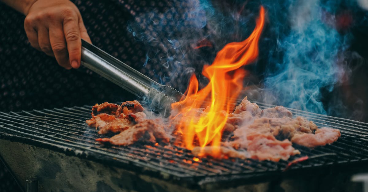 Will the cabin crew heat your own food up? - Close-Up Photo of Man Cooking Meat Will the cabin crew heat your own food up? - Close-Up Photo of Man Cooking Meat