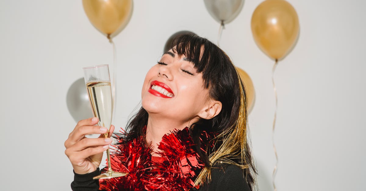Will there be any special event in Paris on November 9th? [closed] - Cheerful young female with closed eyes in tinsel among silver and golden balloons at special event