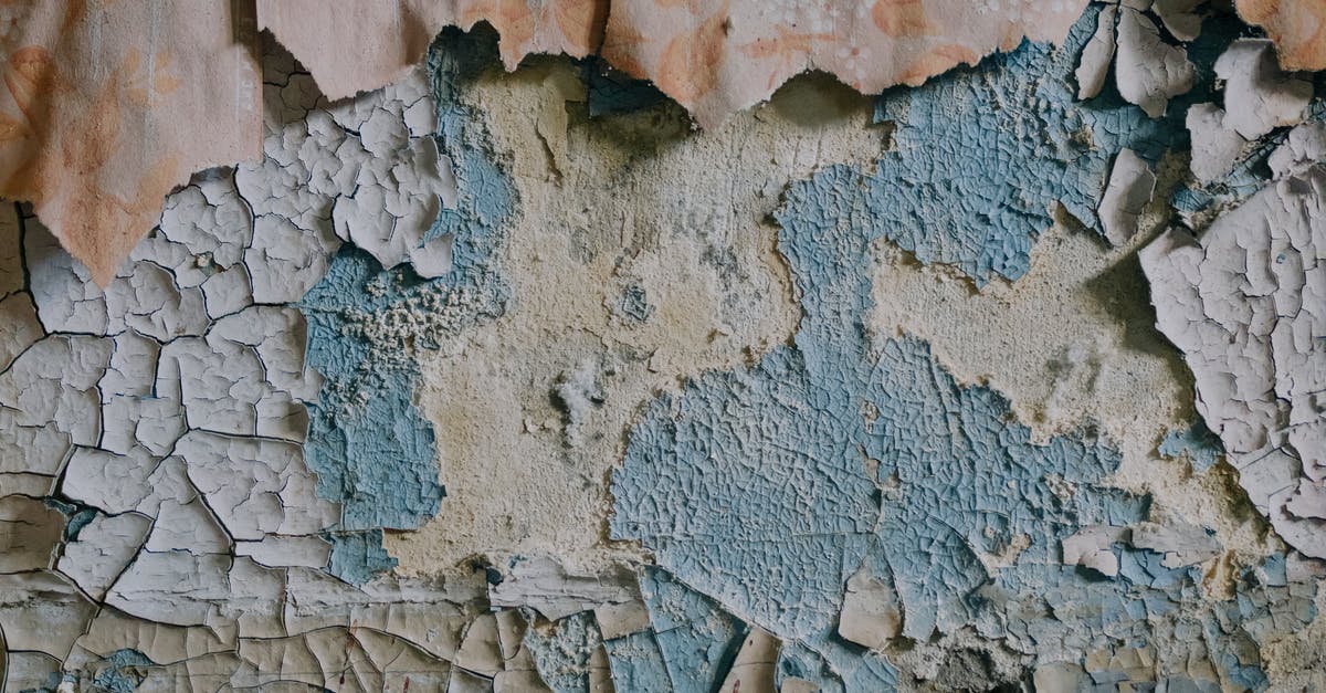 Will this be considered damaged passport? [closed] - White and Brown Concrete Wall