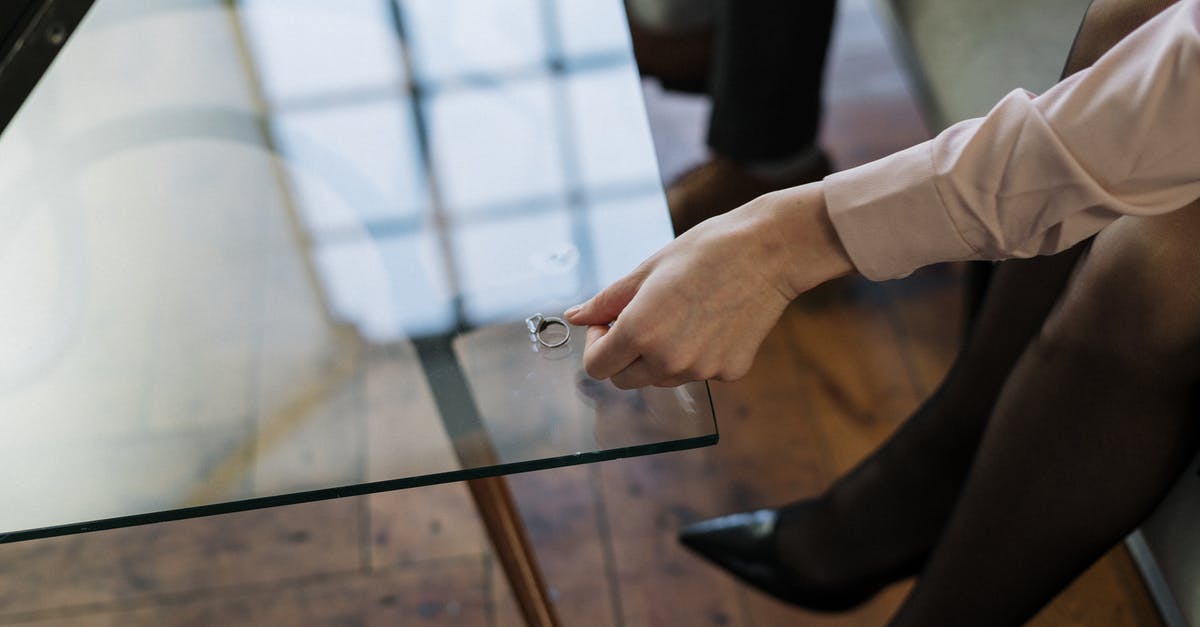 Will this become a problem for remaining in the UK once married? [closed] - Person in White Long Sleeve Shirt Holding Black Pen