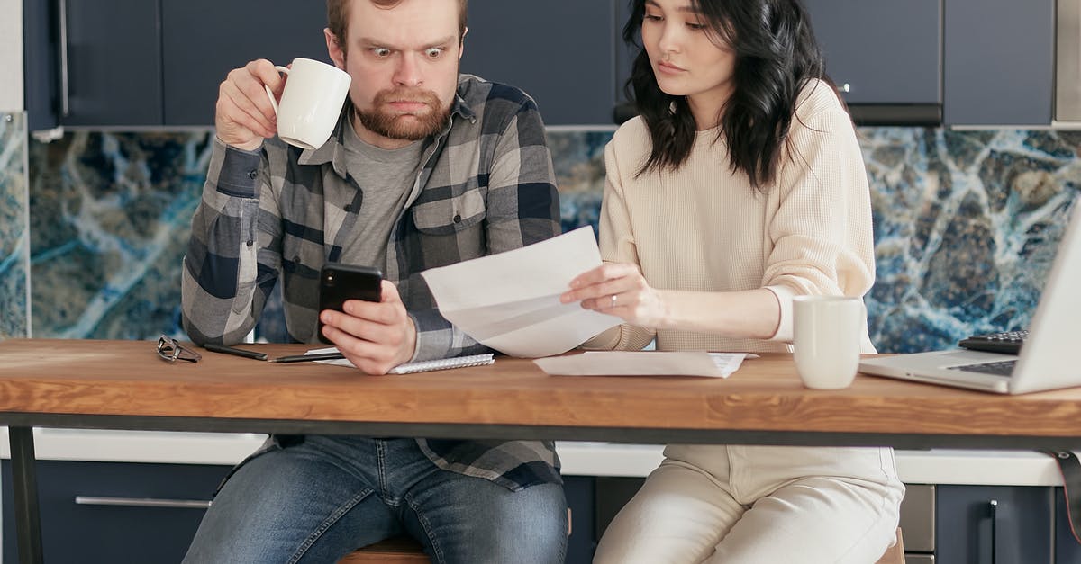 Will US boyfriend have issue visiting me in UK for 3 months? - A Man Looking at the Paper while Holding a Coffee and Phone