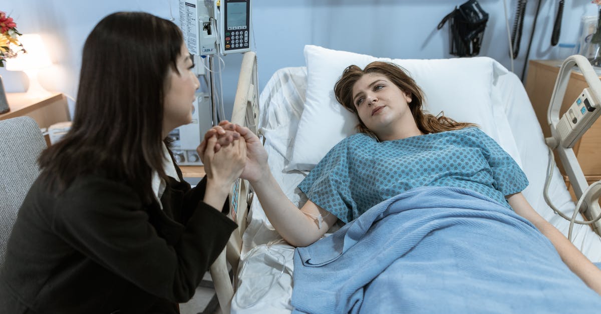 With a two-year visitor visa for the UK, how soon can I re-enter after a visit? - Female Patient visited by an Acquaitance