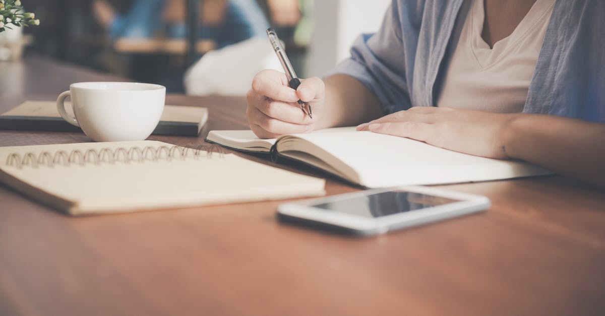 Work permit (Tier 2) - Impact on schengen application (nonEU) - Woman Writing on a Notebook Beside Teacup and Tablet Computer Work permit (Tier 2) - Impact on schengen application (nonEU) - Woman Writing on a Notebook Beside Teacup and Tablet Computer