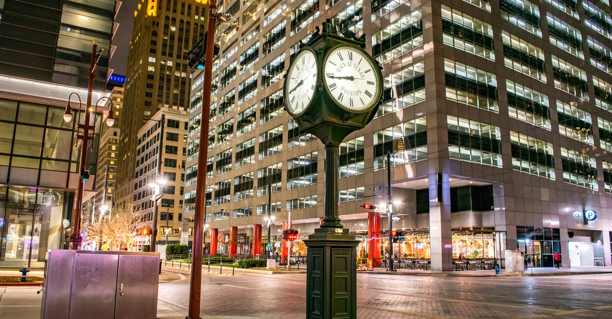 Work remotely for a US employer - Travel to US on tourist visa - Work remotely from hotel/friends part time - Green Street Light Near Brown Concrete Building during Nighttime Work remotely for a US employer - Travel to US on tourist visa - Work remotely from hotel/friends part time - Green Street Light Near Brown Concrete Building during Nighttime