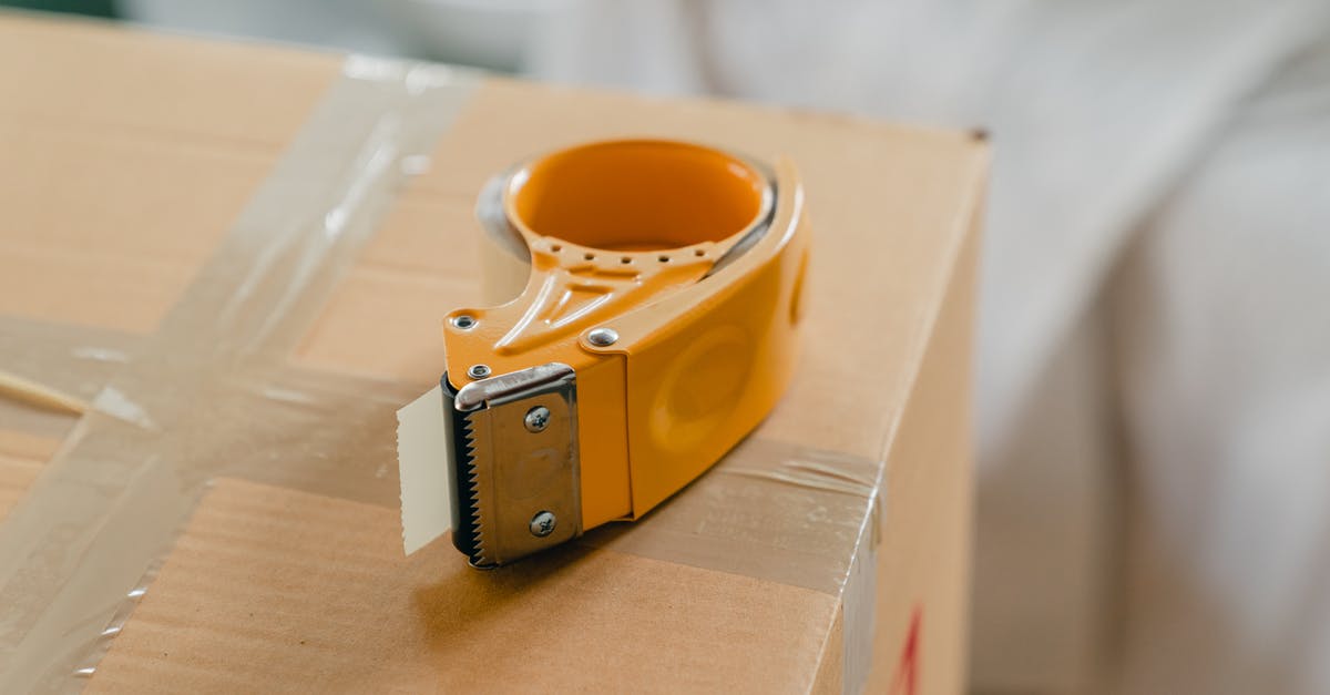 Would an object between 7.5 inched to 8 inches be prohibited as carry on? - Packing tape gun on carton box Would an object between 7.5 inched to 8 inches be prohibited as carry on? - Packing tape gun on carton box