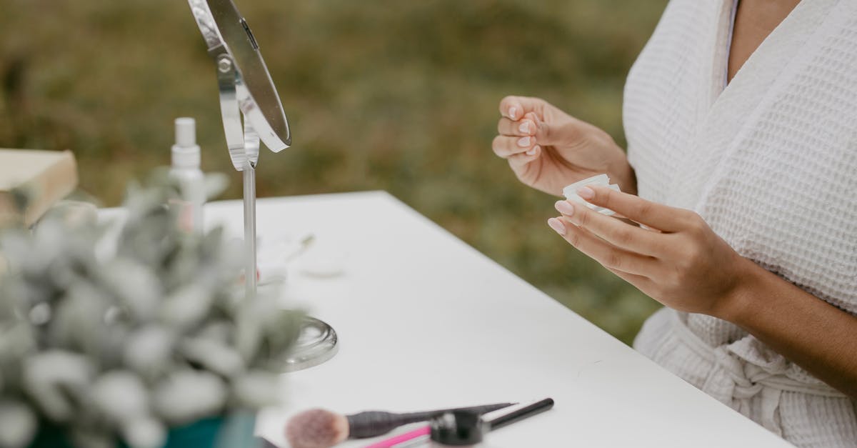 Would applying henna on my fingers change my fingerprints? - Person Holding Silver Bread Knife