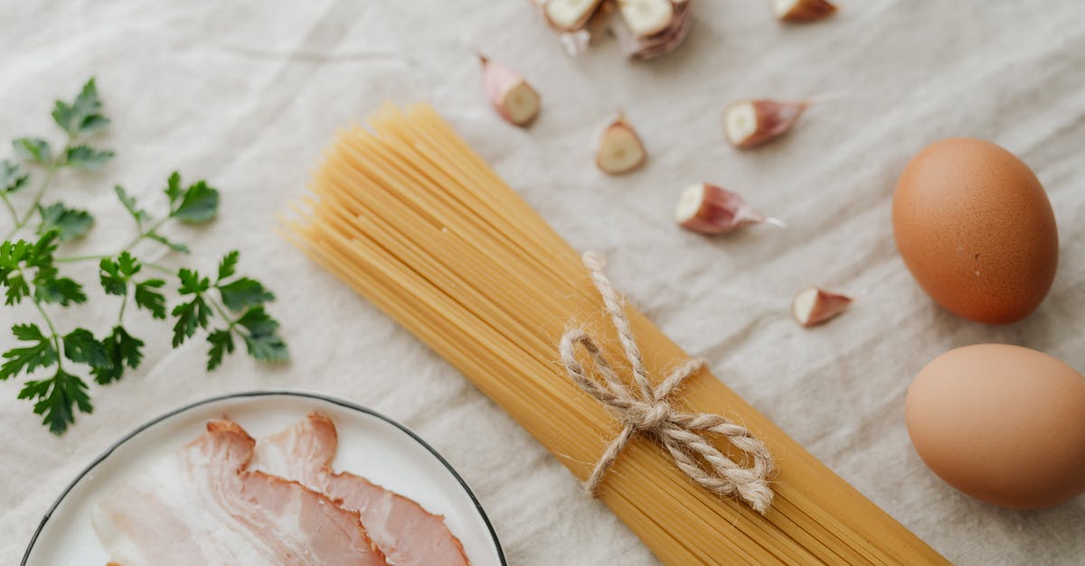 Would uncooked bacon go bad in a transatlantic flight? - Photo Of Sliced Garlic Beside Pasta Would uncooked bacon go bad in a transatlantic flight? - Photo Of Sliced Garlic Beside Pasta