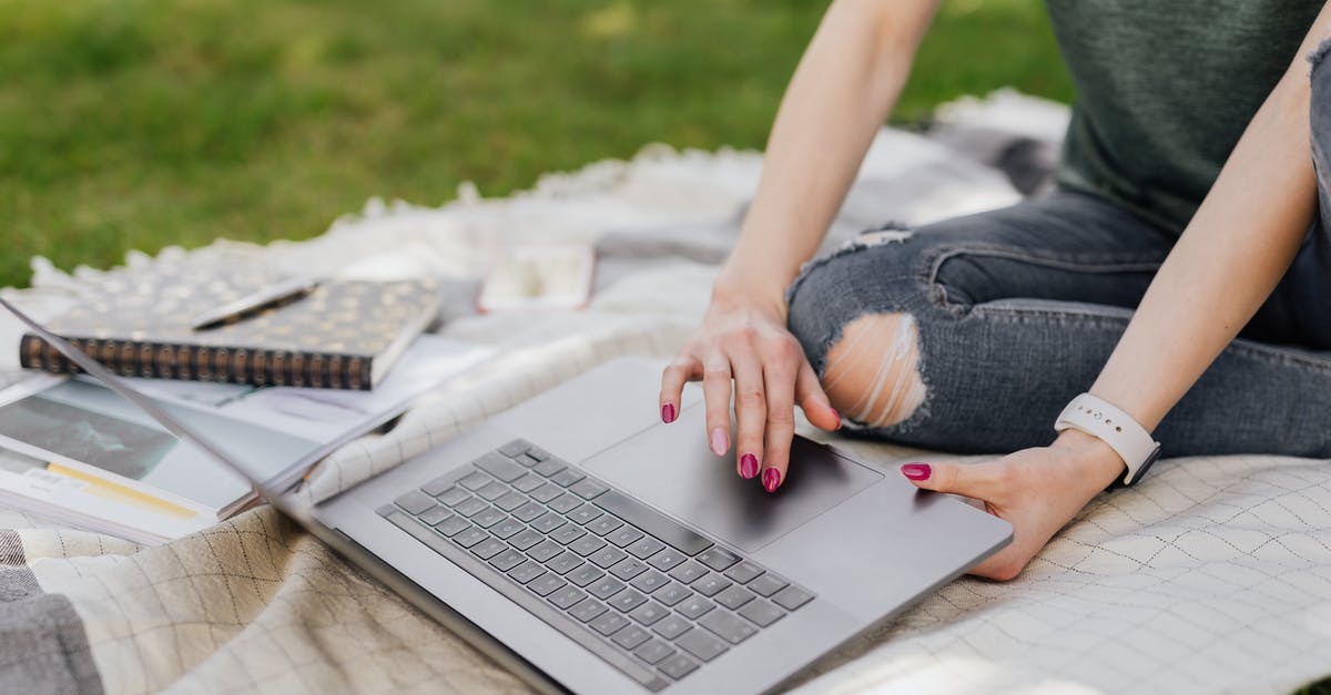 You can't visit the Schengen area if you don't study nor work? - Anonymous lady using laptop for studies in sunny park You can't visit the Schengen area if you don't study nor work? - Anonymous lady using laptop for studies in sunny park